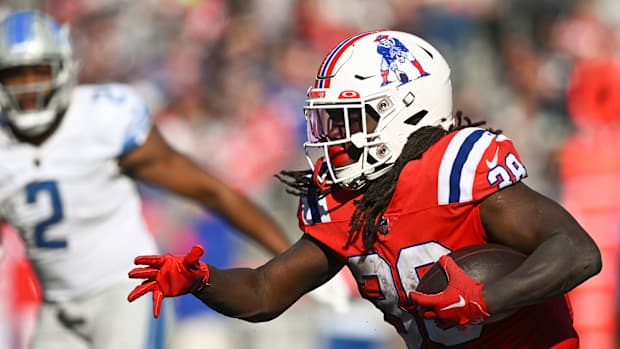 Oct 9, 2022; Foxborough, Massachusetts, USA; New England Patriots running back Rhamondre Stevenson (38) runs with the ball against the Detroit Lions during the second half at Gillette Stadium.